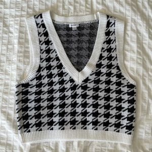Garage sweater vest